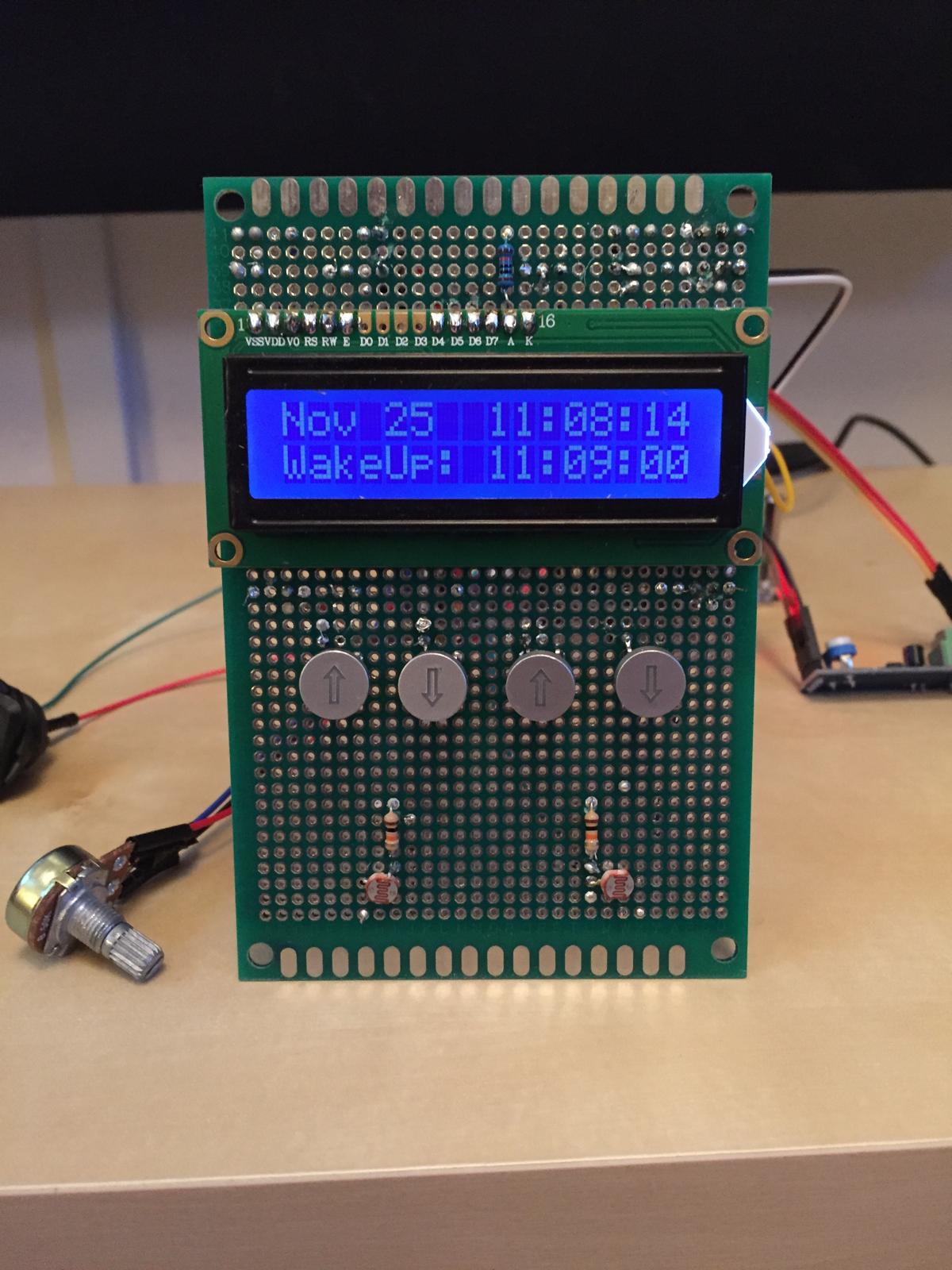 The soldered front panel: LCD, buttons, and photoresistors